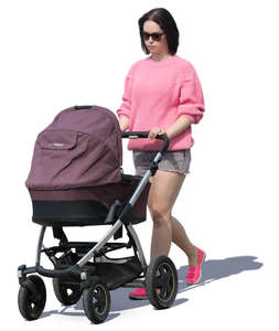 woman with a baby carriage walking