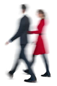 motion blur image of a man and woman walking