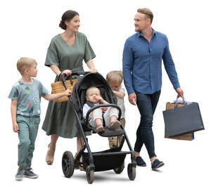 cut out family with three kids and a stroller walking on the street