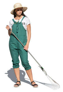cut out woman with a rake working in a garden