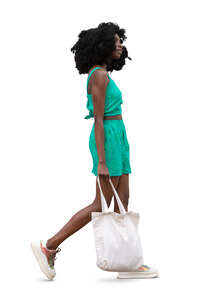 cut out young black woman walking casually