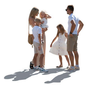 backlit family with children standing in summer