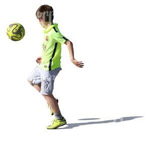 young boy playing with a ball