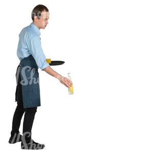 young waiter putting drinks on the table