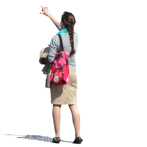 woman standing and pointing at smth