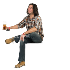 man sitting in a cafe and drinking beer
