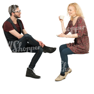 man and woman sitting in a cafe and talking