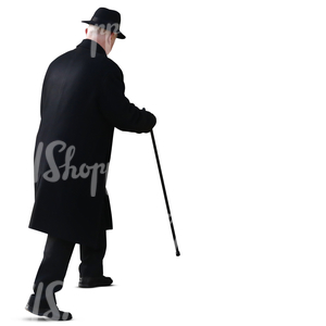 older man with a walking stick walking up the stairs