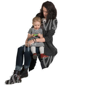 woman sitting with her daughter in her lap