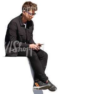 young man sitting and listening to music