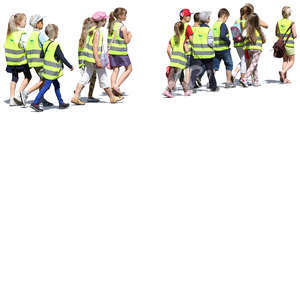group of children wearing reflector vests walking