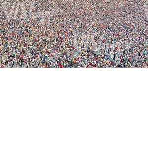 a large crowd standing and listening to a concert
