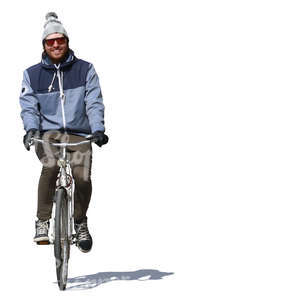 smiling man riding a bike