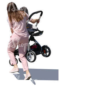 young mother carrying a baby carriage up the stairs
