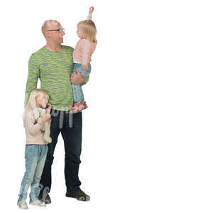 man with two daughters standing in ambient light