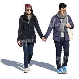 young asian couple walking hand in hand