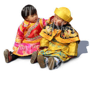 two chinese children sitting on the ground