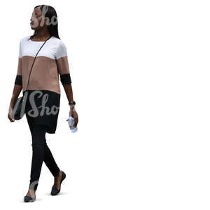 black woman in a dress walking