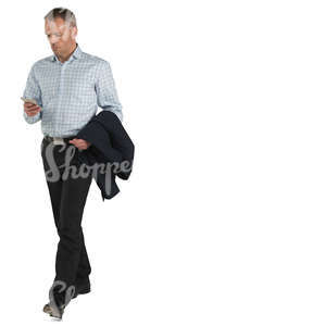 man walking and checking his phone