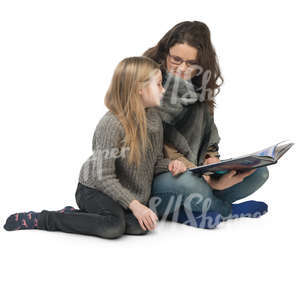 mother and daughter sitting and reading a book