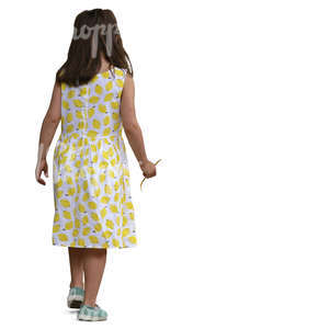 little girl in a summer dress walking