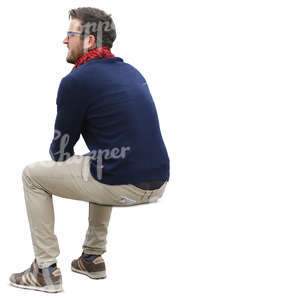 man sitting seen from back angle