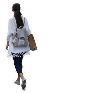 woman with a shopping bag walking