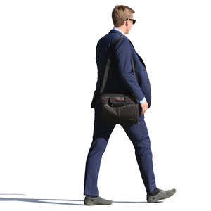 businessman in a blue suit walking