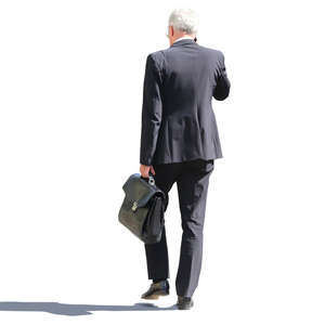 businessman in a dark suit walking
