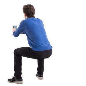 man sitting behind a desk