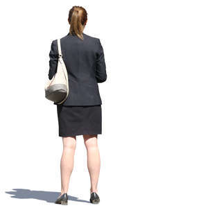 businesswoman in a black costume standing