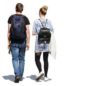 man and woman with backpacks walking in summertime