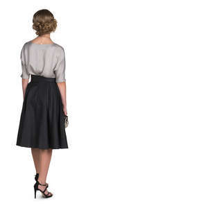 woman in a formal evening outfit standing