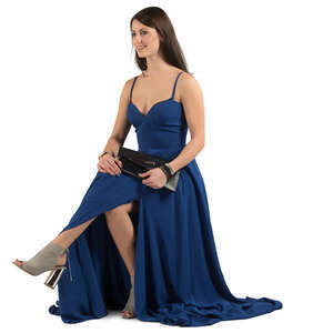woman in a blue evening dress sitting