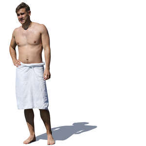 man with a towel standing in sunlight
