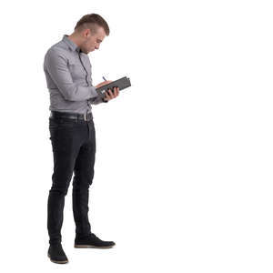 office worker standing and taking notes