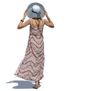 woman with a striped hat and summer dress walking