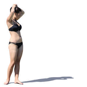 asian woman in a bikini standing