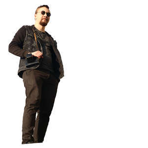 man in black clothing standing seen from below