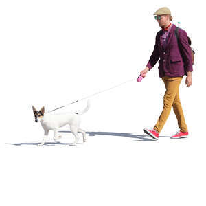 man in a colorful outfit walking a dog