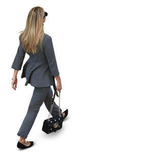 woman in a grey costume walking seen from above