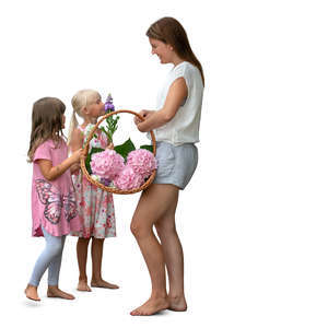 woman with two girls picking flowers