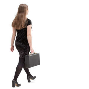woman in a black dress walking