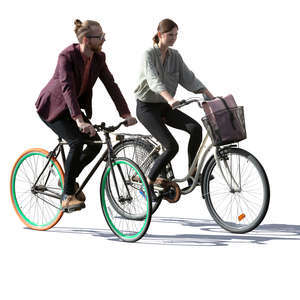 backlit man and woman riding a bike side by side