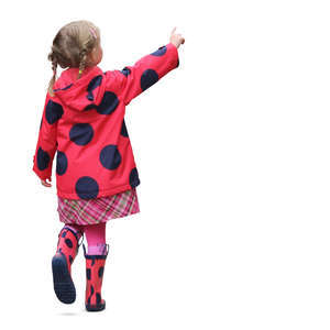 little girl in a red raincoat walking and pointing at smth