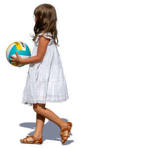 little girl with a ball walking