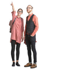 man and woman standing and pointing at smth