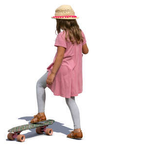 little girl with a skateboard standing
