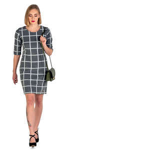 woman in a grey dress walking