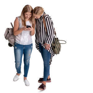 two women looking at a phone seen from above